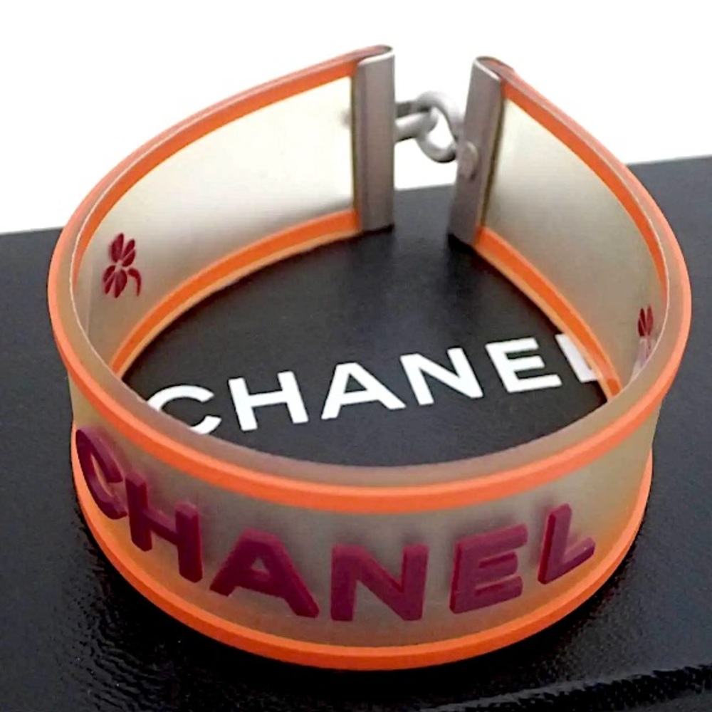 NWOT Vintage 2001 CHANEL Logo Camellia Orange Violet Rubber Cuff Bracelet